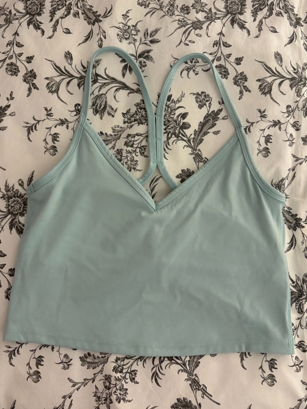 Pale blue women's shelf-lined workout top by Gottex, women's M